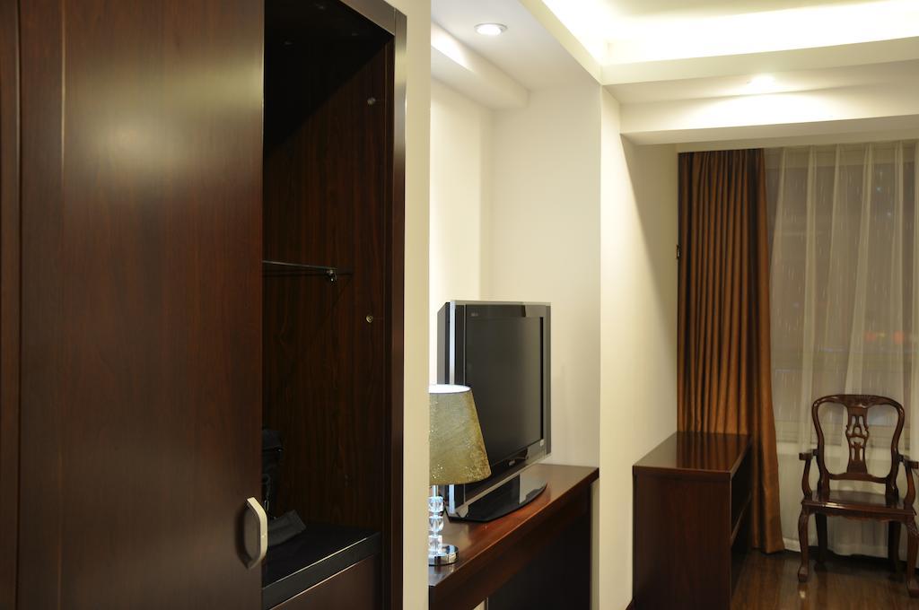 Gan Jin Hotel Tianjin Quarto foto