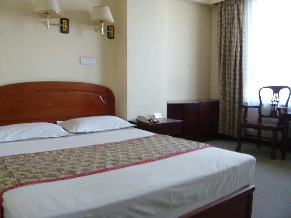 Gan Jin Hotel Tianjin Quarto foto